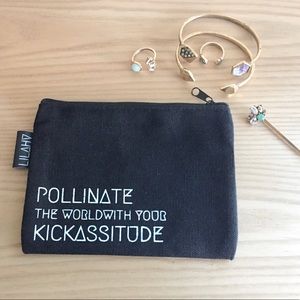 Little black bag.  Ear bud, makeup, cord catchall